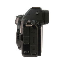 Side view of the Nikon Z 5 Mirrorless Digital Camera with AF-S NIKKOR 28mm f/1.8G Lens and F to Z Adapter Enhanced Macro Kit, featuring various ports, textured grip, WiFi/Bluetooth label, and support for 4K video recording.