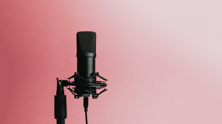 A microphone is featured, highlighting recording and audio equipment. The banner promotes podcasting and recording gear